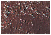 Wind Streaks on Terrain East of Douglass Crater
