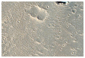Pit in Hephaestus Fossae
