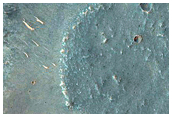 South Flank of Rise at Hydrae Chasma and Lobes at Ophir Catenae