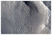 Exit Breach in Impact Crater
