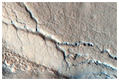 Pits and Fractures in Deuteronilus Mensae
