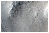 Lava Flow Entering Impact Crater North of Echus Chasma
