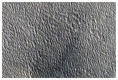 Monitor Ice-Exposing Crater
