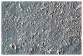 Thermophysically Diverse Deposits on Flank of Arsia Mons
