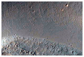 Well-Preserved Crater in Sinai Planum
