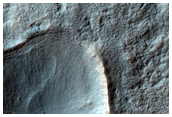 A Crater in Thaumasia Fossae