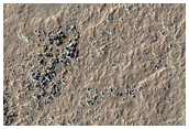 Eastern Terrace Region of Lowell Crater Peak-Ring Basin
