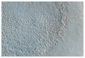 Rocky 1-2 Km Impact Crater
