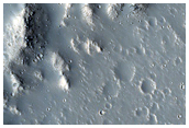 Terrace-Based Well-Preserved Pitted Material of Crater in Kasei Valles
