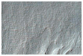 Gully Exposing Bright Material

