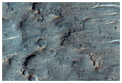 Possible Origin of Channel in Tyrrhena Terra