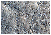 Crater with Tall Mesa in Northern Mid-Latitudes
