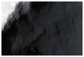 Crater and Ejecta in Daedalia Planum
