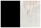 Exposed Fractured Bedrock in Central Uplift of Crater Near Valles Marineris
