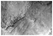 Ridges and Differing Thermal Terrains in Northwest Syrtis Major Planum 
