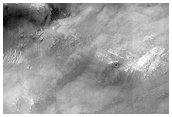 Ejecta Blanket Infilling Older Crater
