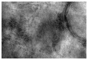 Crater and Ejecta in Northern Plains
