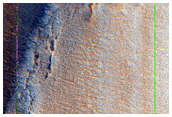 Dipping Layers along Old Crater Rim in Deuteronilus Mensae