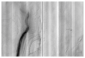 Dipping Layers in Depressions South of Deuteronilus Mensae
