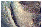 Cracks on Crater Floor in Northern Mid-Latitude Crater
