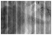 Dipping Layers Against Mounds in Northern Plains
