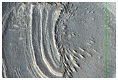 Layered Deposit in Crater in Northern Mid-Latitudes
