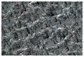 Dark Spot on South Polar Layers
