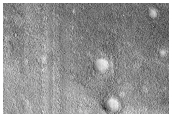 Layered Mesa in Small Northern Mid-Latitude Crater
