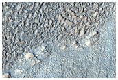 Layered Deposits in Crater in Hellas Montes
