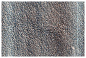 Evidence of Flow in Potential Buried Ice
