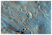 Possible Carbonate or High Temperature Hydrous Mineral-Rich Terrain
