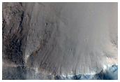 Crater Ejecta Spilling onto Floor of Another Crater
