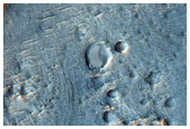 Bedrock Exposed in Floor of Crater in Terra Cimmeria
