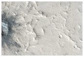 Dusted Fresh Impact Crater
