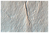 Gully Exposing Bright Material