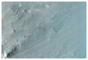 Impact Crater on Floor of Larger Crater
