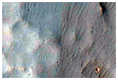 Bedrock Layers Exposed in Crater Rim
