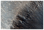 Impact Crater on Northern Plains
