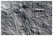 Fresh Crater with Thin Ejecta South of Semeykin Crater
