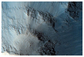 Monitor Low-Albedo Wall Spurs in Coprates Chasma
