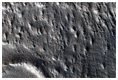 Flow in Northern Mid-Latitude Crater
