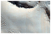 Cratered Features in Olympus Mons Aureole
