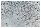 Channel Connected to Crater in Memnonia Region
