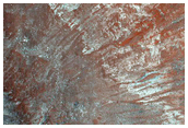 Crater on Floor of Coprates Chasma
