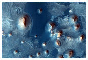Arabia Terra with Stair-Stepped Hills and Dark Dunes