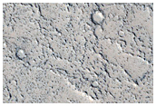 Lava Flows and Mounds in Tartarus Montes
