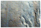 Curved Ridges along Trough Wall in Acheron Fossae
