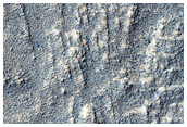 Transverse Ridges on Euripus Mons
