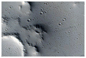 Crater on Apron Near Uranius Mons
