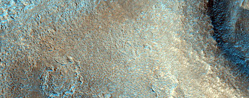 Dipping Layers in Crater in Deuteronilus Mensae
